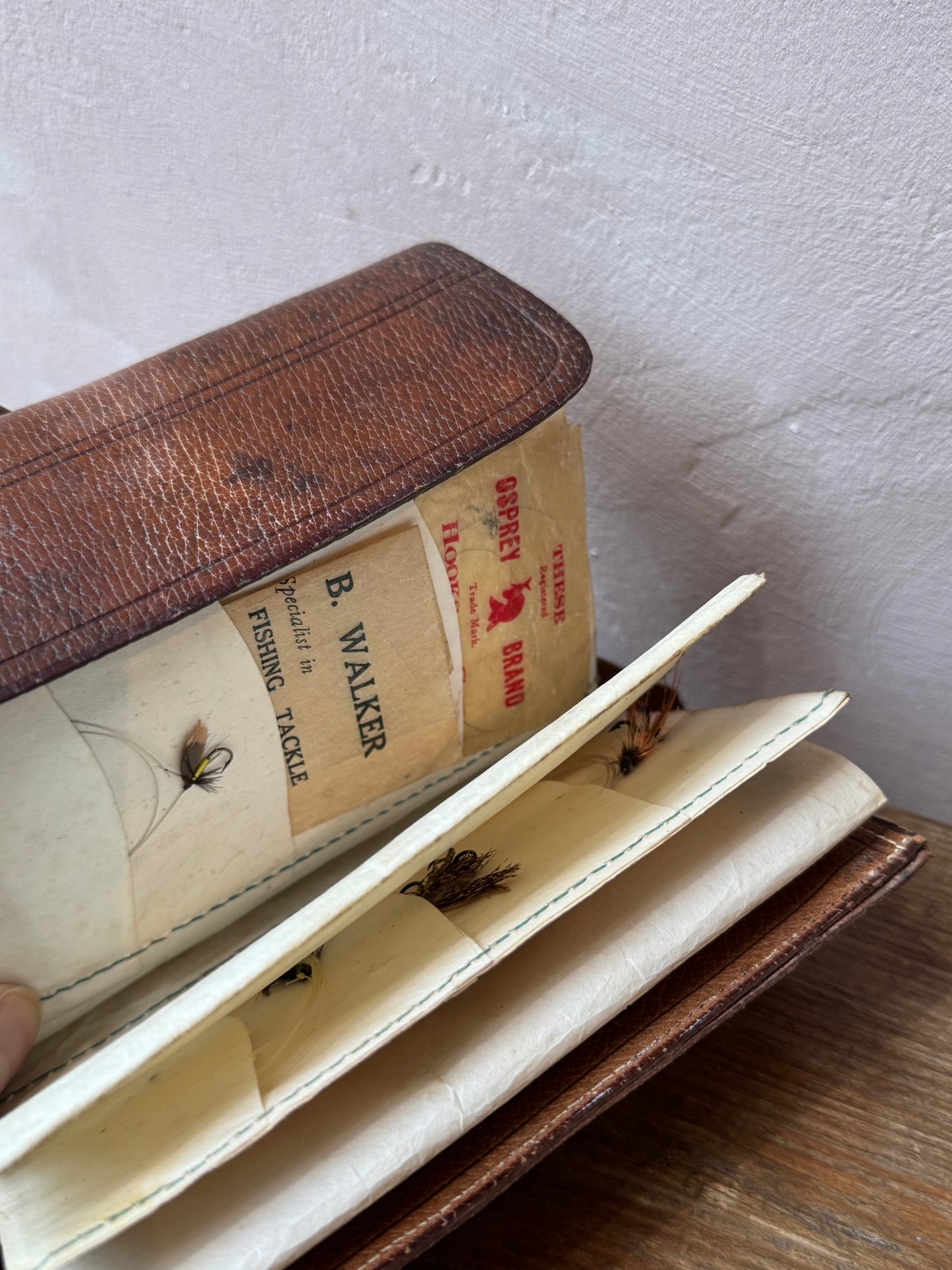 Antique leather fly fishing wallet