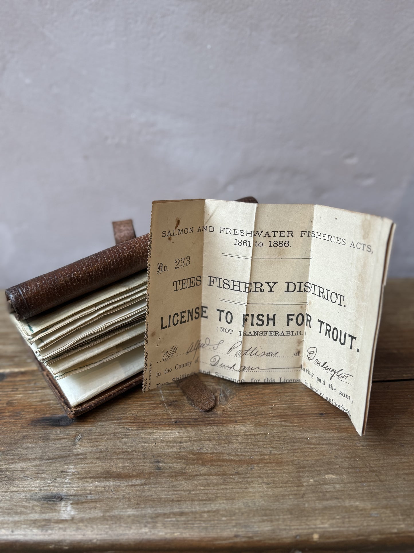 Antique leather fly fishing wallet
