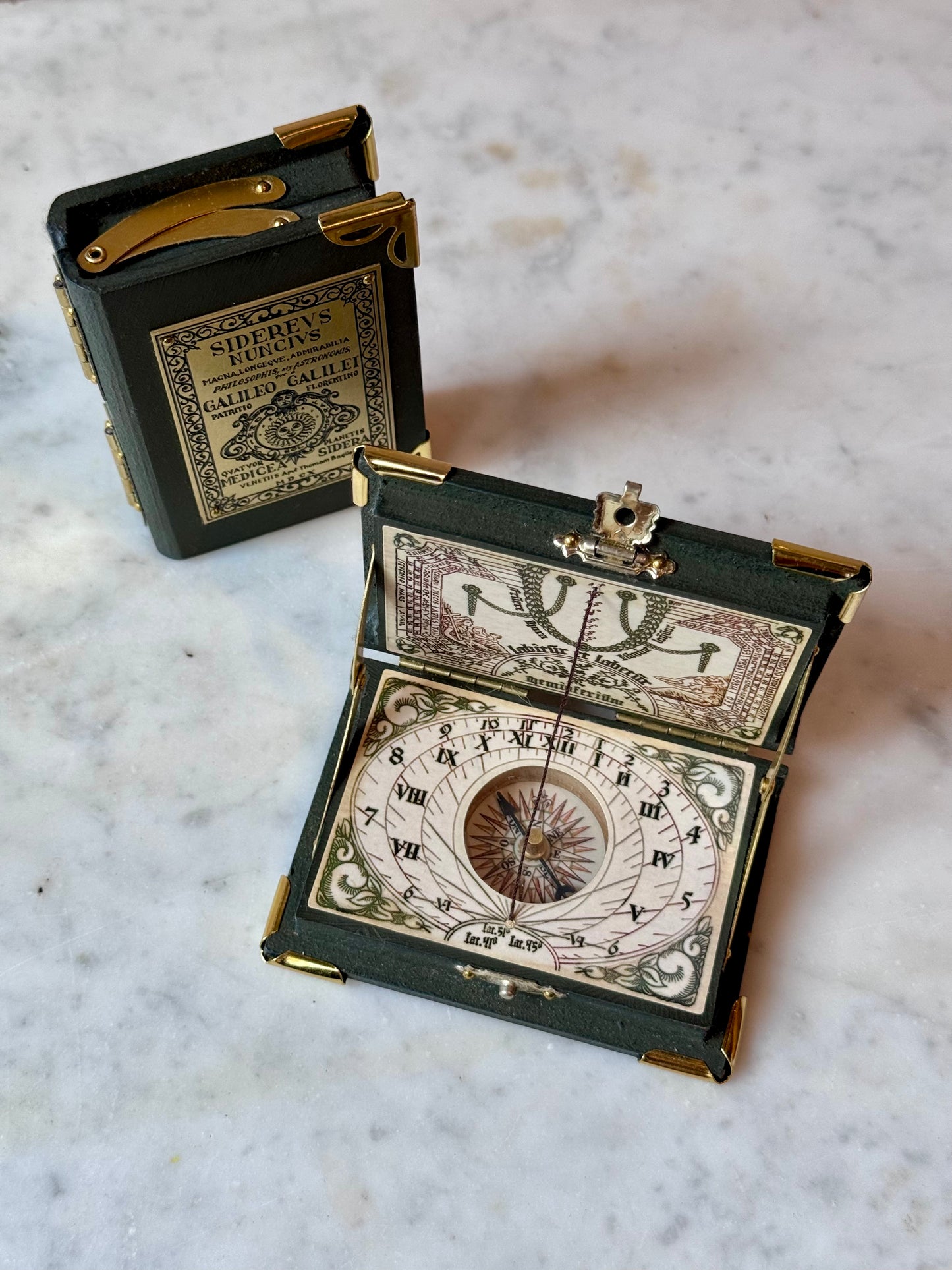 Pocket sundial with compass