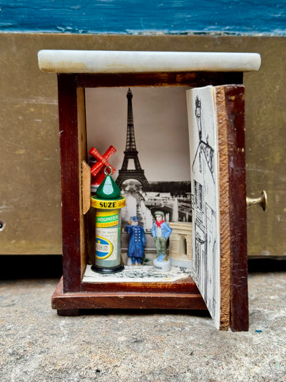Paris in a Cabinet by Messy Nessy