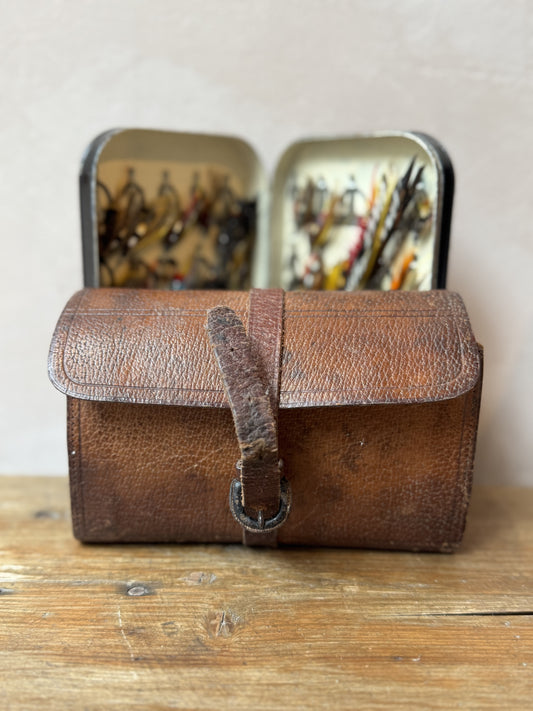 Antique leather fly fishing wallet