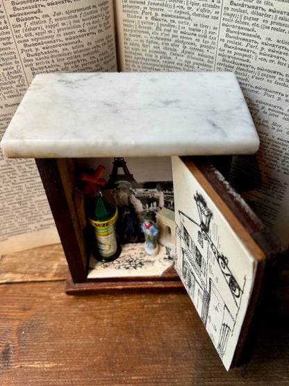 Paris in a Cabinet by Messy Nessy